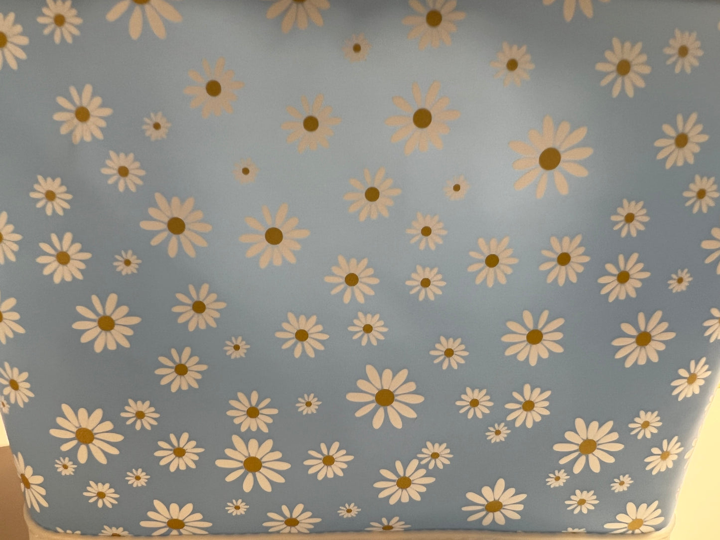 Introducing the Jelly Fabric Daisy Print Blue Makeup Bag! 8.5”W x 5.5”H