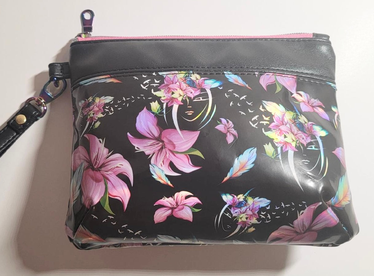 Jelly Fabric Floral/Face Print Wristlet! 8”W x 6”H